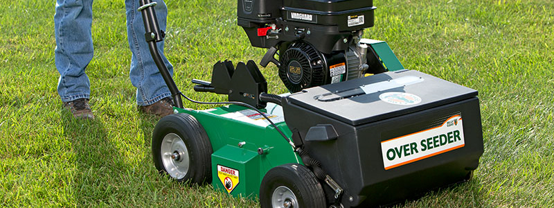 An overseeder being used for fall lawn care.